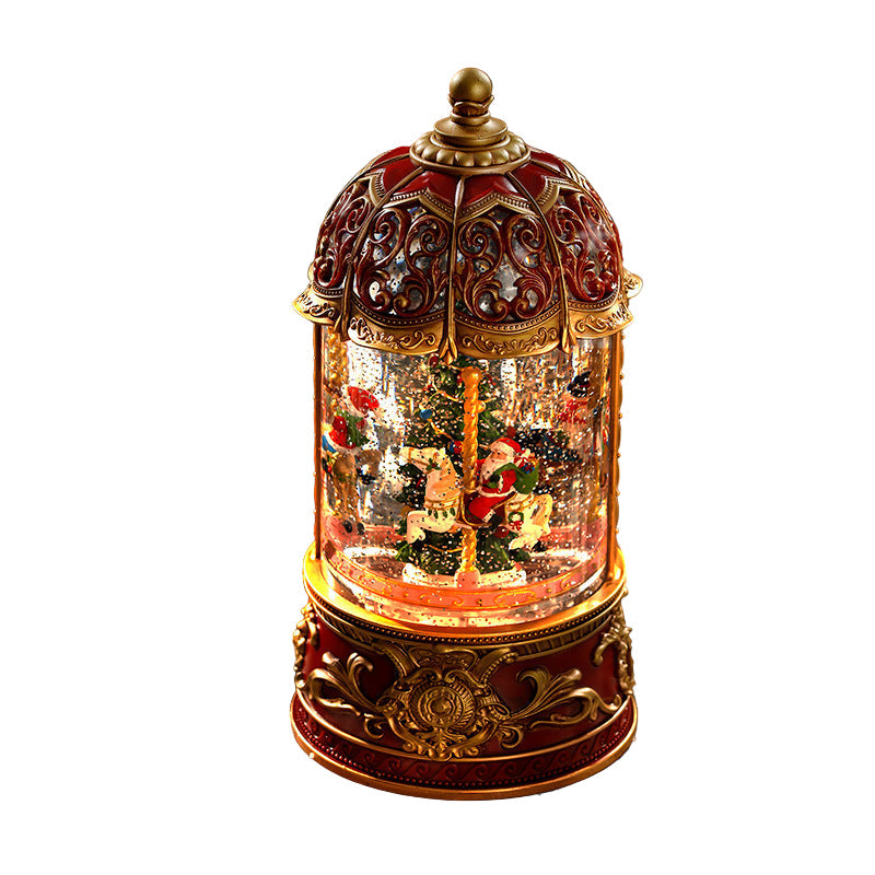 Decorative snow globe with a carousel scene on a white background