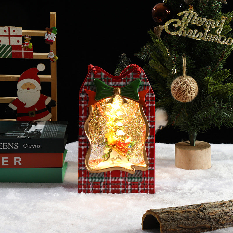 Decorative Christmas lantern with plaid design in front of a Christmas tree and festive decorations.