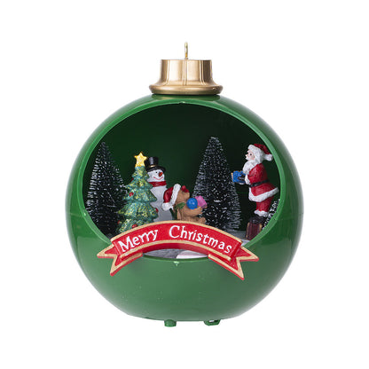 Green Christmas ball with Santa Claus, snowman, and reindeer inside, featuring a 'Merry Christmas' banner.