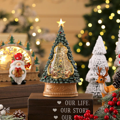 Decorative Christmas tree with lights and ornaments on a wooden base, surrounded by festive decorations.